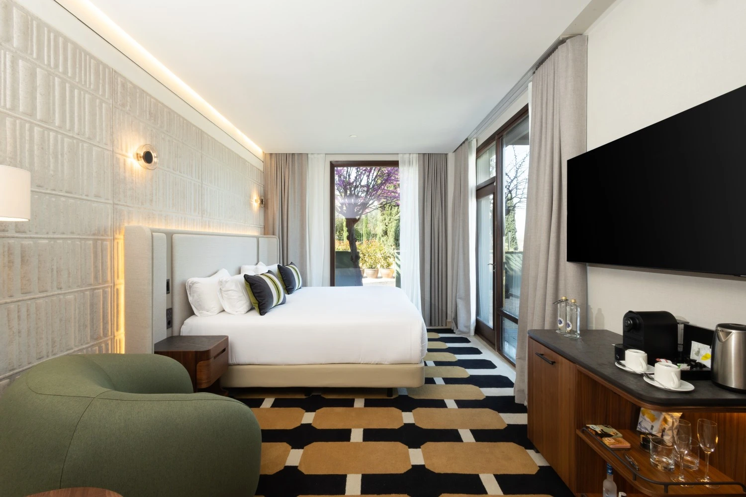 Contemporary two-bedroom composition featuring large windows overlooking the city.