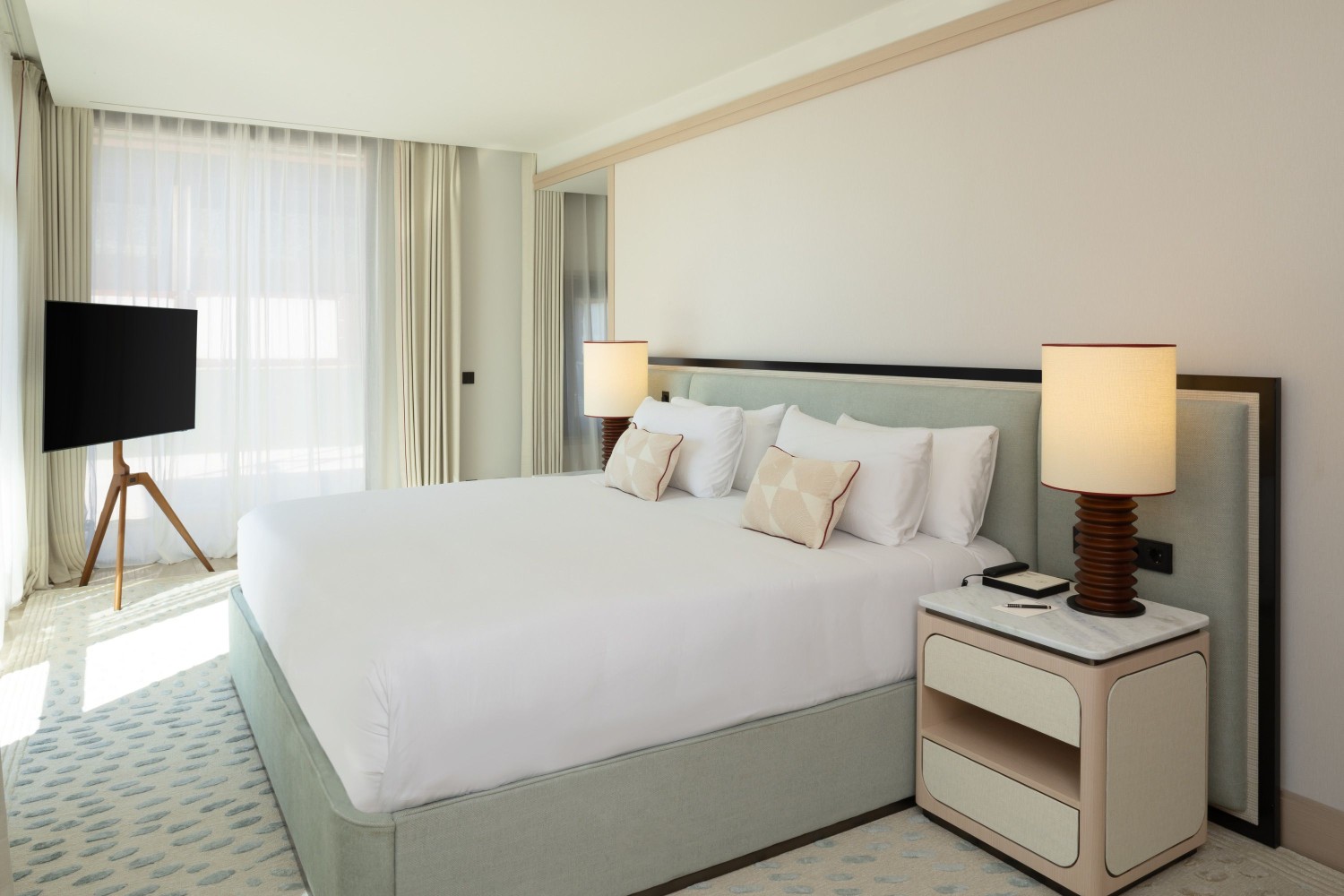 Interior of the Presidential Suite featuring contemporary design and Mediterranean views.